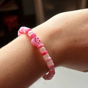 Pink smiley bracelet